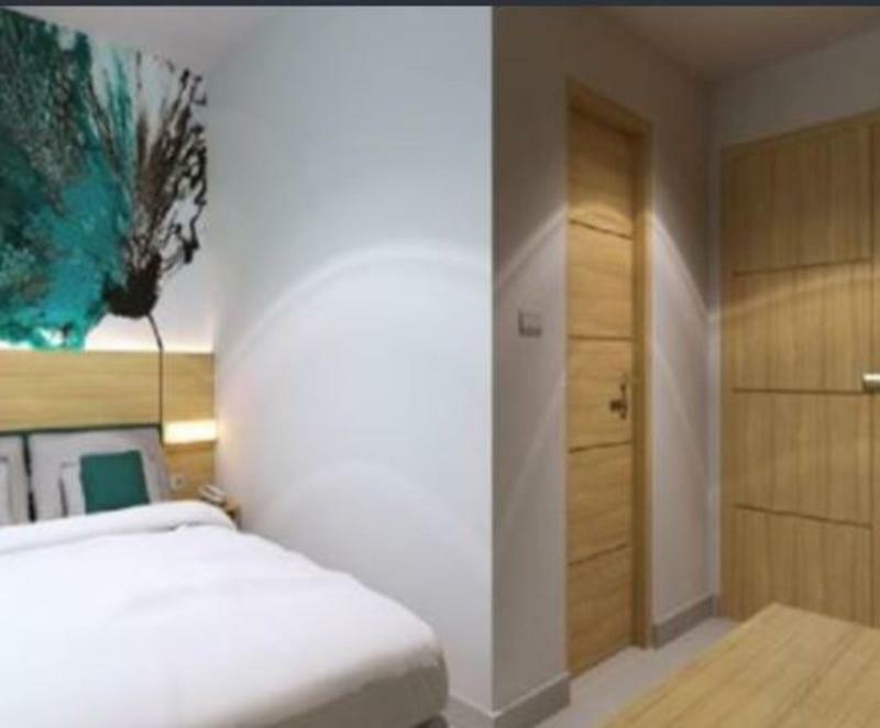 Reddoorz @ Hotel Arimbi Dewi Sartika Baru Бандунг Экстерьер фото